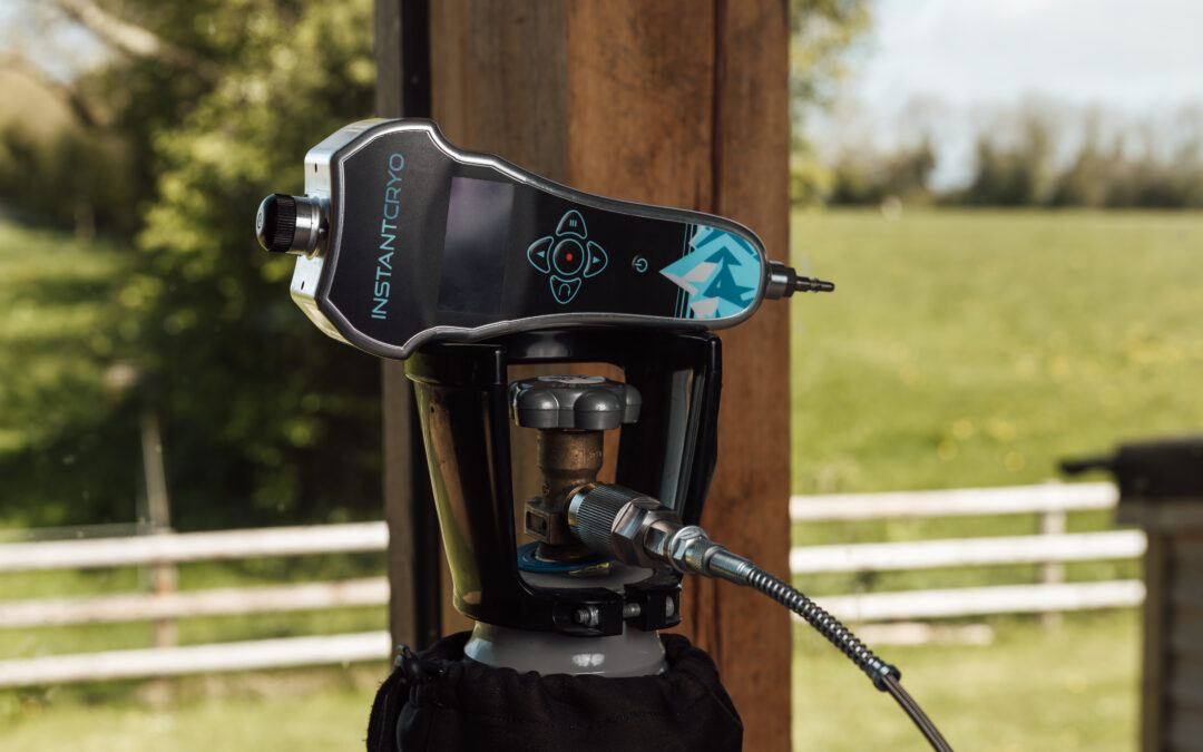 A localized cryotherapy machine attached to a gas cylinder.