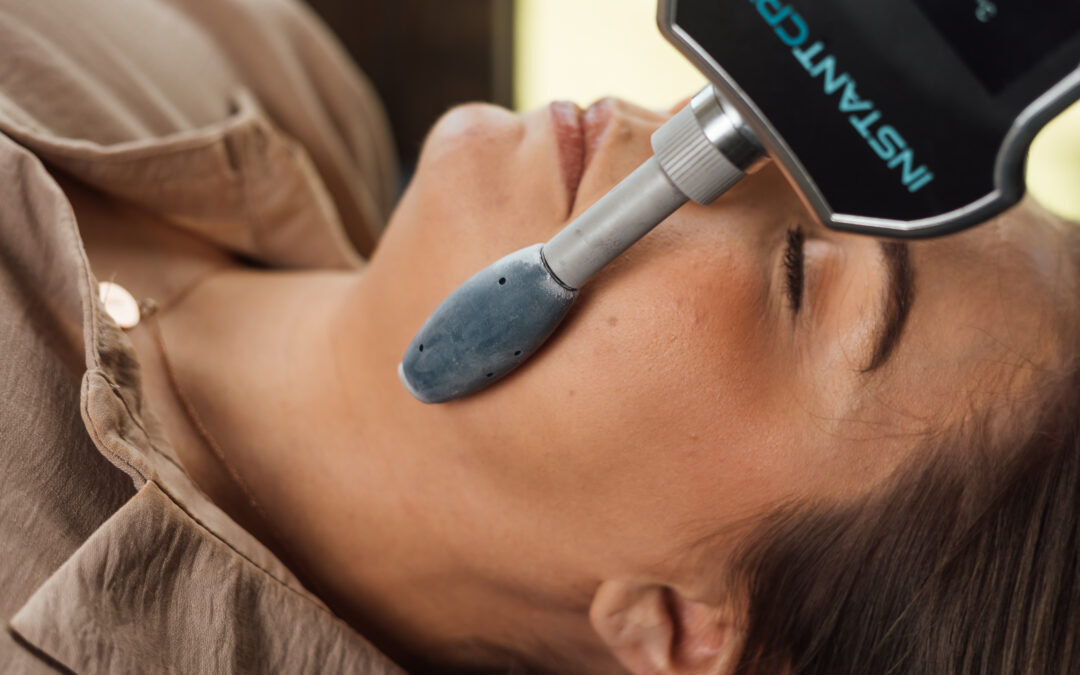 Cryo facial roller being used on a face for a facial